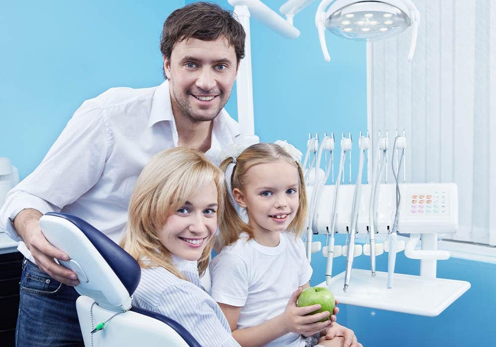 Parents and daughter at the dentist feeling comfortable Westside Dentistry